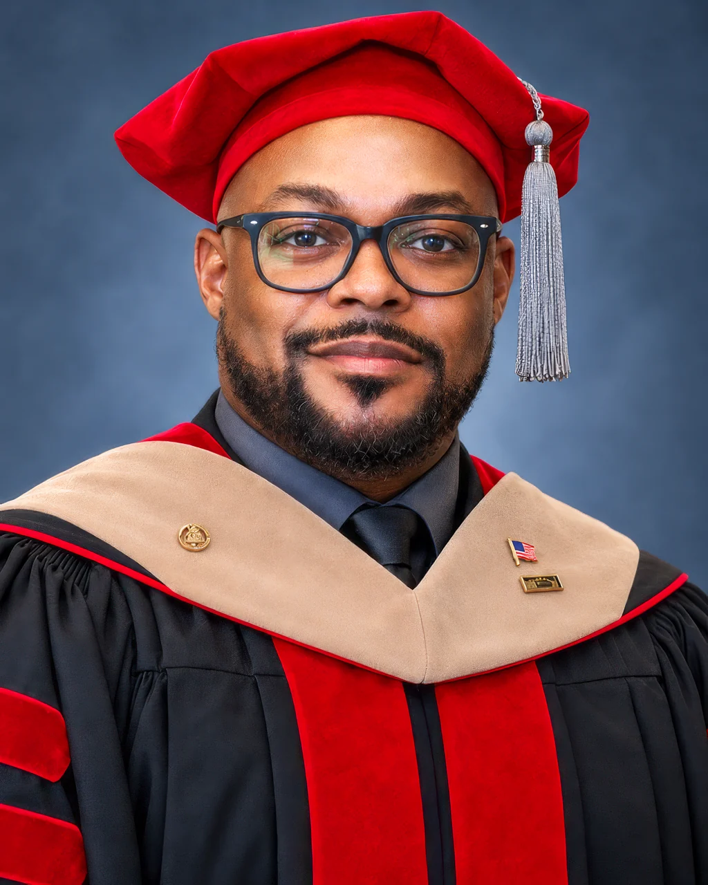 Dr. Donte Vaughn in doctoral regalia
